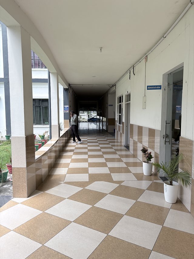 Corridor down the academic block with wall-mounted air conditioning units